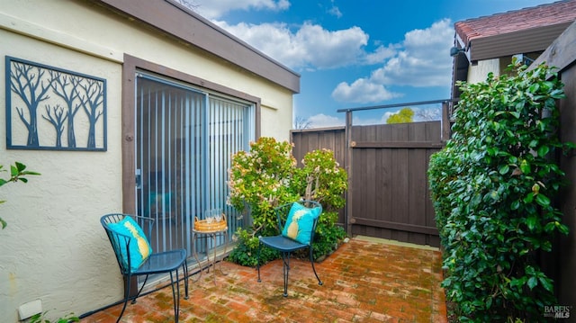 view of patio with fence