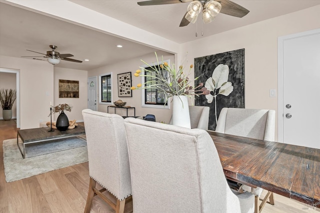dining room featuring light wood-type flooring, ceiling fan, and recessed lighting