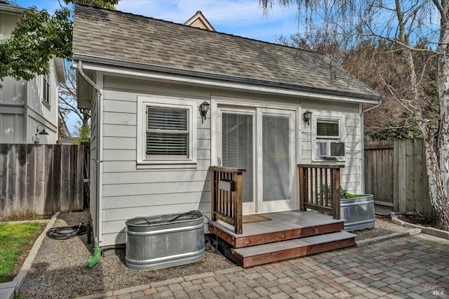 view of outbuilding with an outbuilding and fence private yard