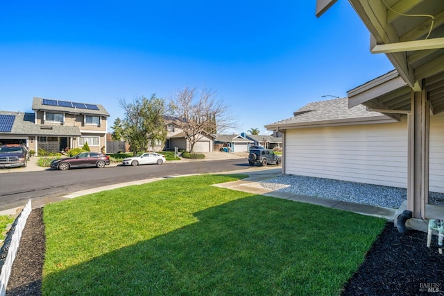 view of yard with a residential view