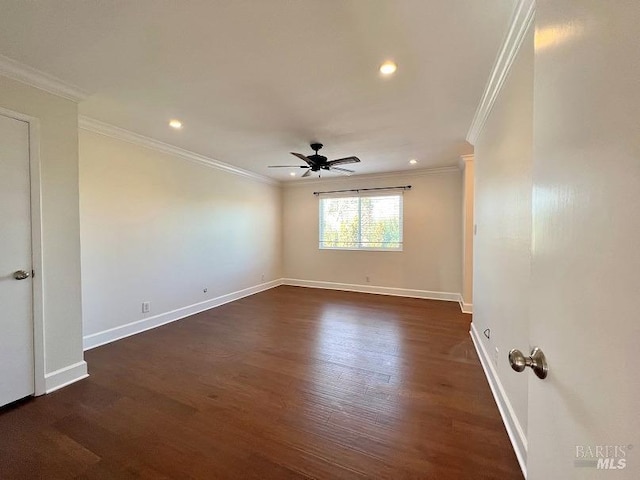 empty room featuring ceiling fan, recessed lighting, baseboards, dark wood finished floors, and crown molding