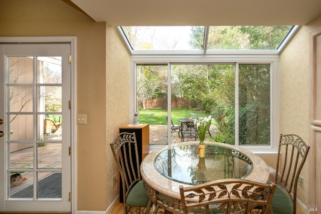 sunroom featuring a skylight