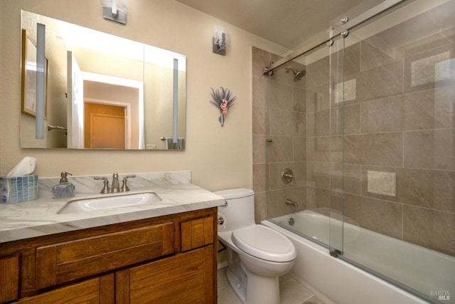 bathroom with shower / bath combination with glass door, vanity, and toilet