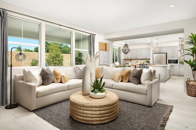 living area with a wealth of natural light and recessed lighting