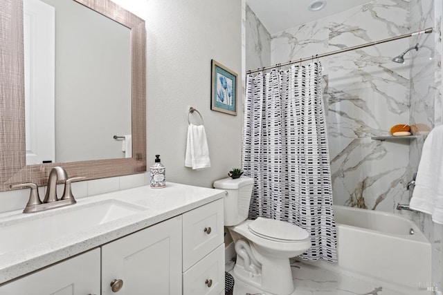 full bath featuring shower / bath combo, marble finish floor, vanity, and toilet