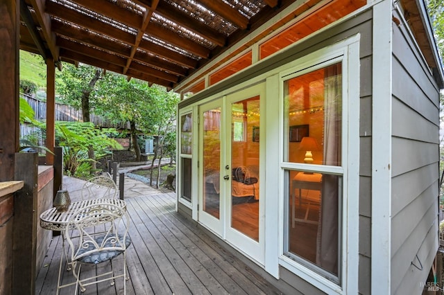 wooden deck with french doors and fence