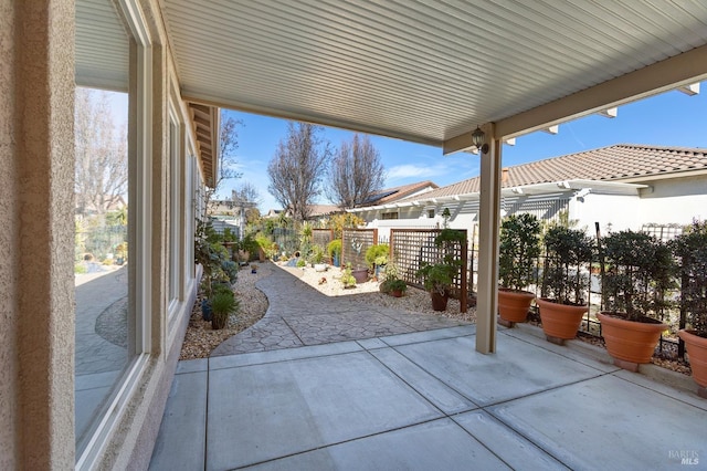 view of patio with fence