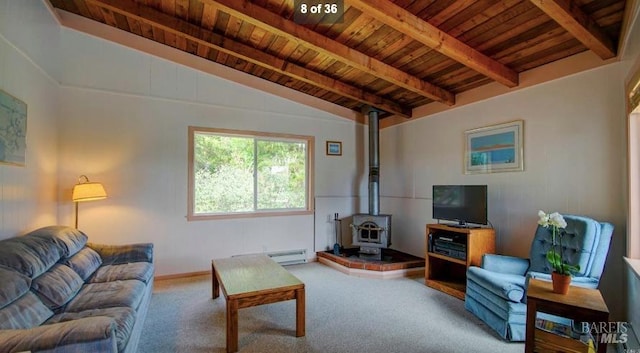 carpeted living area featuring a wood stove, wooden ceiling, and vaulted ceiling with beams