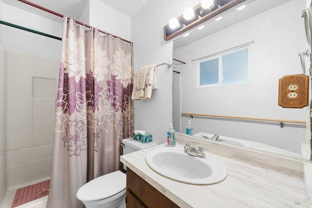 full bath featuring shower / bathtub combination with curtain, vanity, and toilet