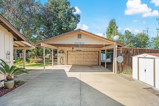 garage featuring a shed and a detached garage