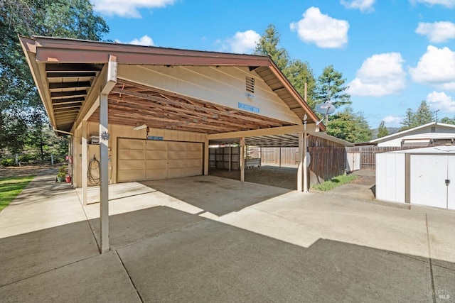 garage featuring a storage shed