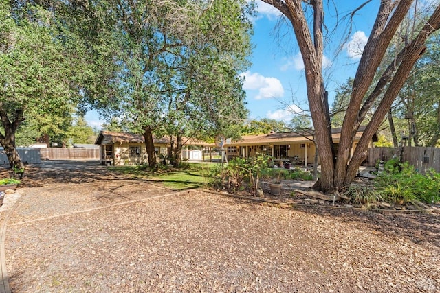 view of yard featuring fence