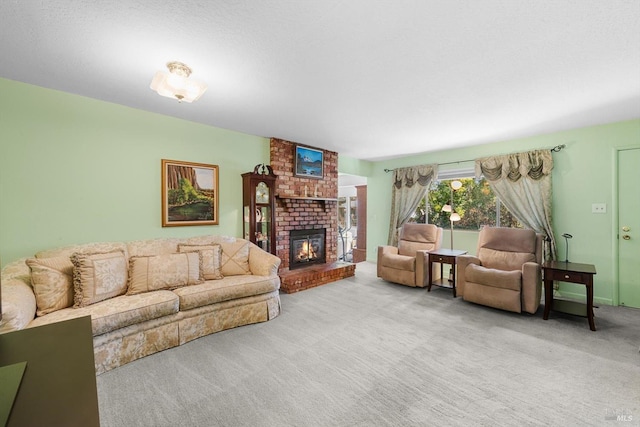 carpeted living area with a brick fireplace