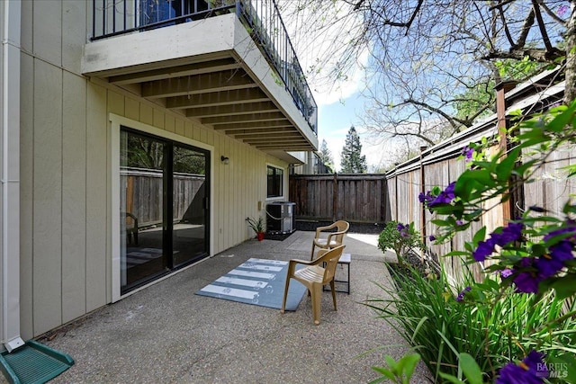 view of patio / terrace featuring a fenced backyard and cooling unit