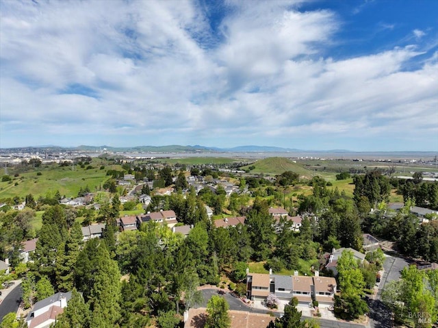 birds eye view of property with a mountain view and a residential view