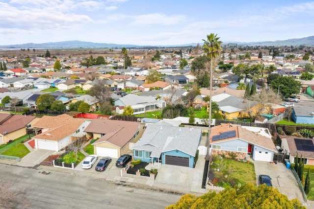 bird's eye view featuring a mountain view and a residential view