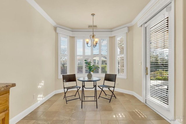 dining area with baseboards, a chandelier, ornamental molding, and light tile patterned floors