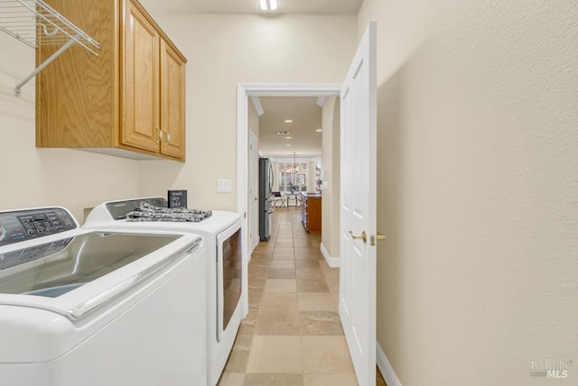 washroom with cabinet space, baseboards, separate washer and dryer, recessed lighting, and light tile patterned flooring