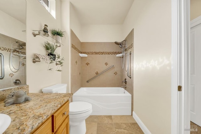 bathroom with vanity, shower / tub combination, and toilet
