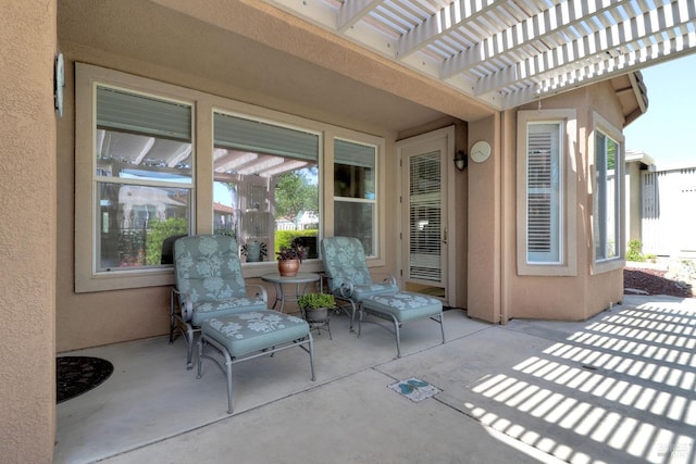 view of patio / terrace featuring a pergola