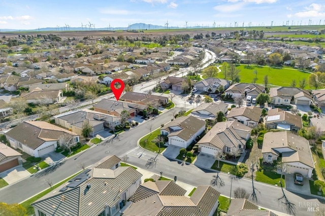 bird's eye view with a residential view and a mountain view