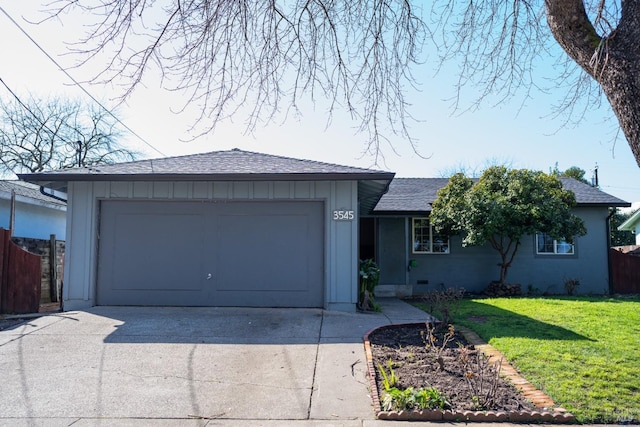 view of front of house featuring a garage, concrete driveway, roof with shingles, board and batten siding, and a front yard