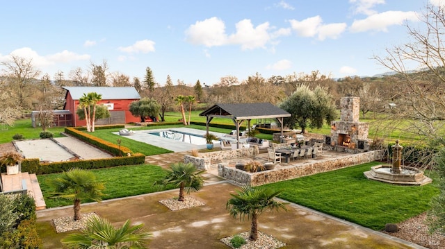 exterior space with a pool, a patio area, a yard, and a gazebo