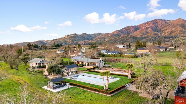 aerial view featuring a residential view and a mountain view