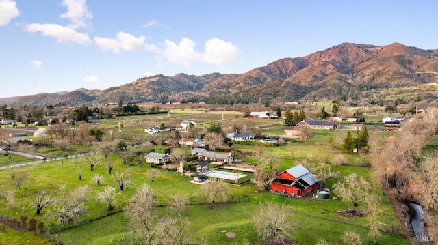 aerial view featuring a mountain view and a rural view