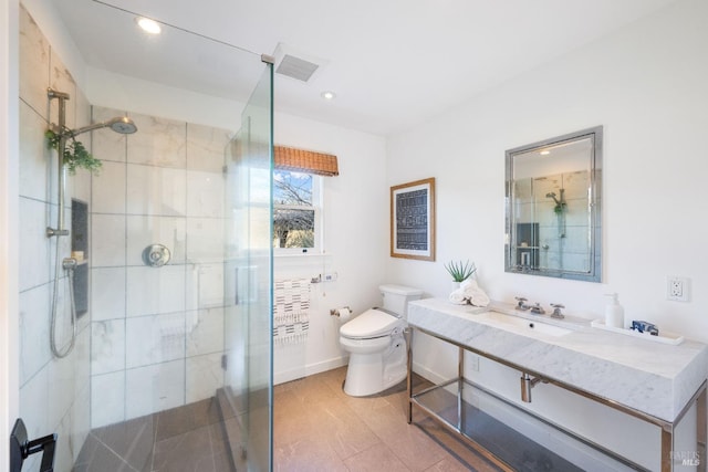 bathroom with visible vents, a stall shower, toilet, and recessed lighting