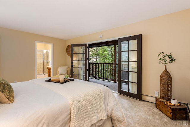 bedroom with light carpet, a baseboard radiator, ensuite bathroom, and access to exterior