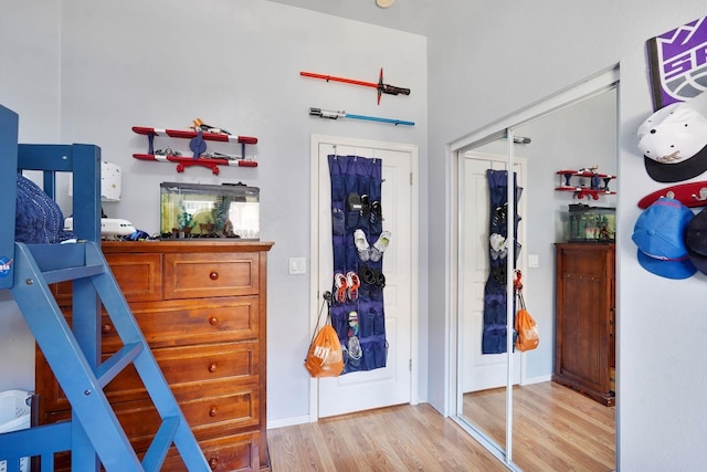 bedroom with wood finished floors