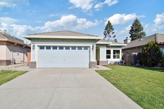 ranch-style home with a garage, concrete driveway, brick siding, and a front lawn