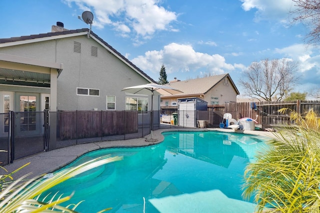 view of pool with a fenced backyard and a fenced in pool