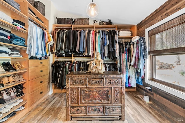 spacious closet with light wood-style flooring