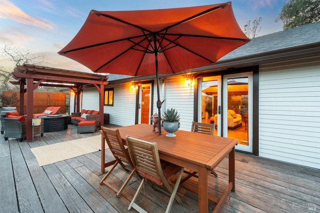 wooden deck with outdoor dining area, outdoor lounge area, and a gazebo