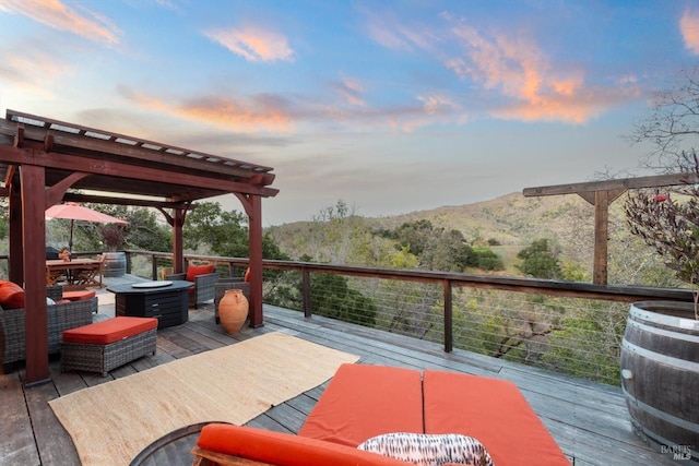 wooden terrace featuring a pergola