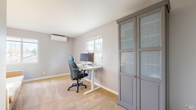 home office featuring an AC wall unit, light colored carpet, and baseboards