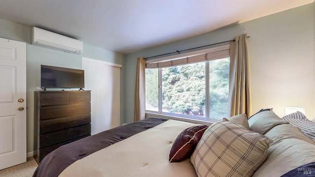 bedroom featuring a wall mounted AC