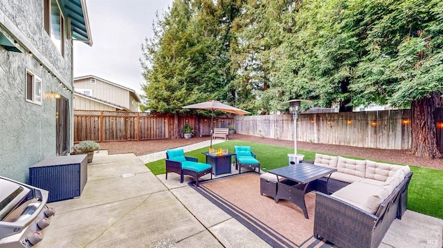 view of patio with outdoor dining area, a fenced backyard, and an outdoor living space