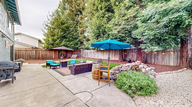 view of patio / terrace featuring a fenced backyard and an outdoor hangout area