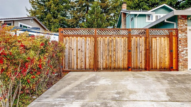 view of gate with fence