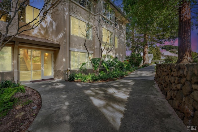 exterior space with stucco siding