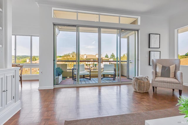 sitting room featuring baseboards