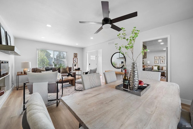 483 Rinconada Ct, Benicia, CA 94510 - dining room featuring wood finished floors, a ceiling fan, recessed lighting, and baseboards