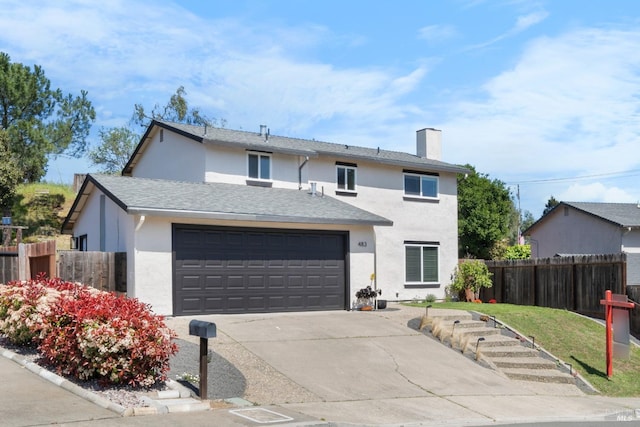 483 Rinconada Ct, Benicia, CA 94510 - traditional-style home with stucco siding, an attached garage, driveway, and a chimney