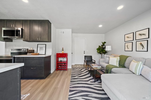 483 Rinconada Ct, Benicia, CA 94510 - living room with light wood finished floors and recessed lighting