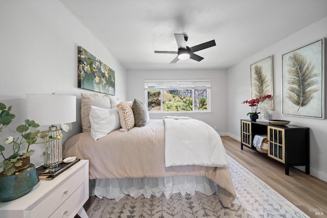 483 Rinconada Ct, Benicia, CA 94510 - bedroom featuring light wood finished floors, baseboards, and a ceiling fan