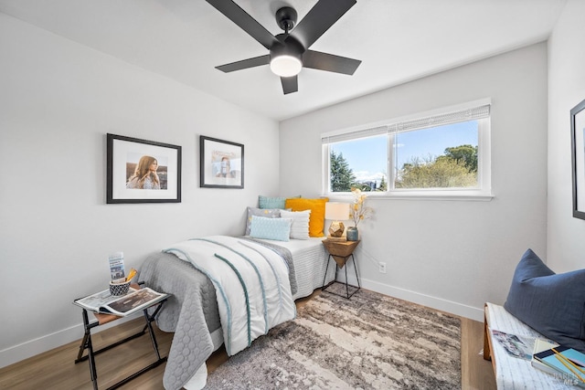 483 Rinconada Ct, Benicia, CA 94510 - bedroom with baseboards, wood finished floors, and a ceiling fan