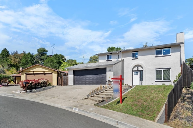 483 Rinconada Ct, Benicia, CA 94510 - view of front of property featuring stucco siding, driveway, an attached garage, and a chimney